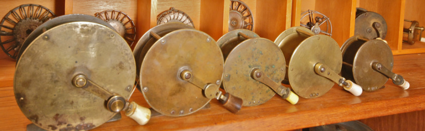 A Tacklewise Polybox, Vintage and Later Fishing Reels to include